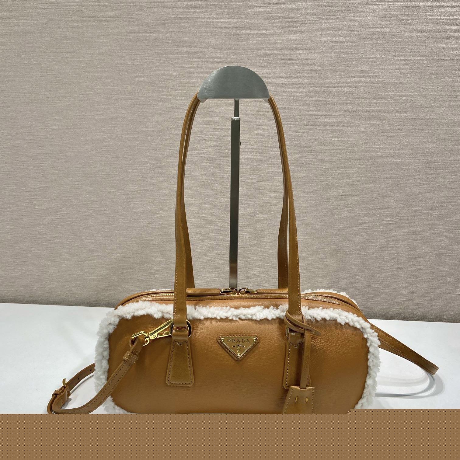 Pra*a top handle bags